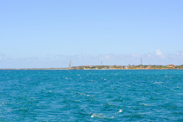 A beautiful coastal view on Aruba island from Caribbean sea. Space for text. 