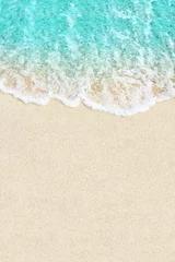 Poster Soft ocean wave on white sand beach background © Oleandra9