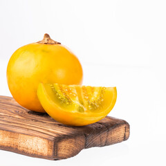 Organic naranjilla fruit in white background - Solanum quitoense