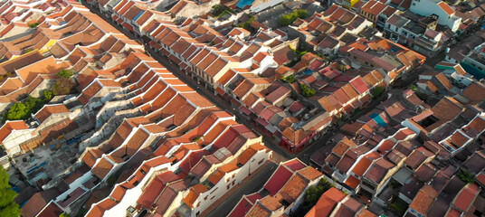 Malacca, Malaysia. Aerial view of city homes and skyline from drone on a clear sunny day