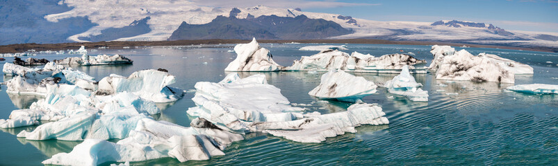 Panoramic view of Jokulsarlon lagoon with icebergs, summer season in Iceland