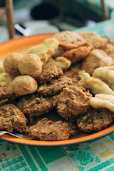 Local snacks from Ponorogo, Indonesia called Lentho made from tolo beans served with another gorengan include pisang goreng, tofu and tempeh goreng.