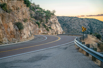 Drive up Mount Lemmon Arizona with winding road along rocky cliffs at sunset. Beautiful nature...