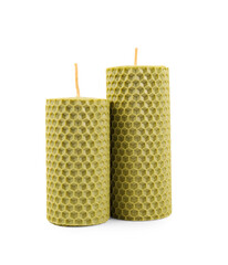 Stylish elegant beeswax candles isolated on white