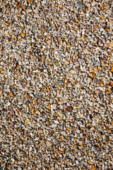 Background of loose stones spread on a pathway