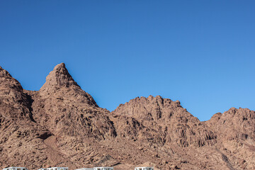 Mount Sinai is the mountain at which the Ten Commandments were given to Moses by God