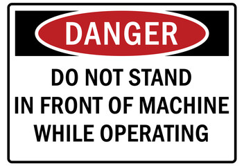 Machine hazard sign and labels do not stand in front of machine while operating