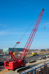 Fototapeta na wymiar crane on the repair of a large highway