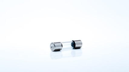macro photo of mini fuse to prevent short circuit isolated on white background