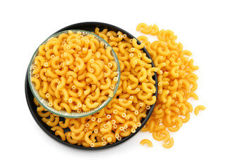 Plate of uncooked elbow pasta on white background