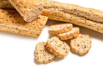 Loaves of delicious baguette isolated on white background