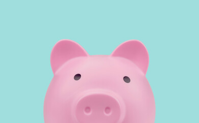 Close up front view of pink piggy bank isolated on light blue background with clipping path. copy space.