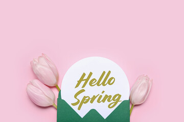 Card with text HELLO SPRING and beautiful tulip flowers on pink background