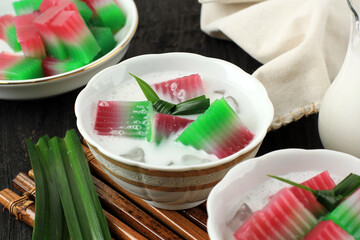 Es Selendang Mayang. Traditional Dessert Drink from Jakarta, Indonesia. Rice flour Pudding served with Coconut Milk and Sweet Syrup