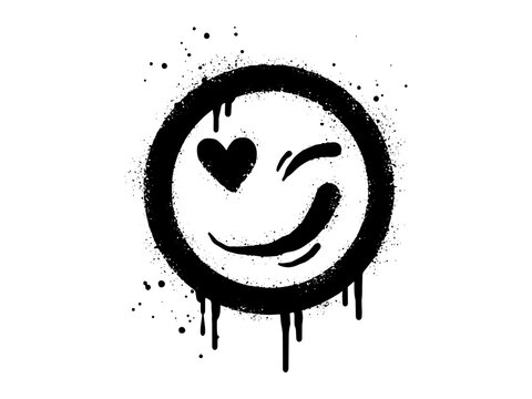 Smiling Face Emoticon Character. Spray Painted Graffiti Smile Face With Love In Black Over White. Isolated On White Background. Vector Illustration