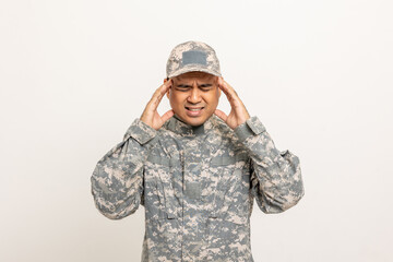 Stressed depressed crying lose war Asian man special forces soldier against on isolated. Commander Army soldier military defender of the nation in uniform standing in studio white background