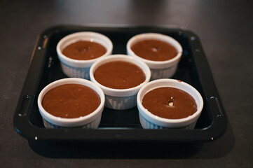Selective focus view of chocolate lava cake prepared for baking