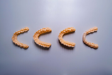 model of the lower jaw of the mouth guard. top view and flatly. geometric pattern like a line. high quality horizontal photo in dentist office. 