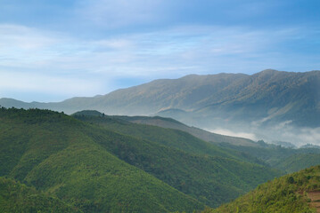 Naklejka premium Natural background of the mountain views with blue sky in the winter of Nan province, The north of Thailand.