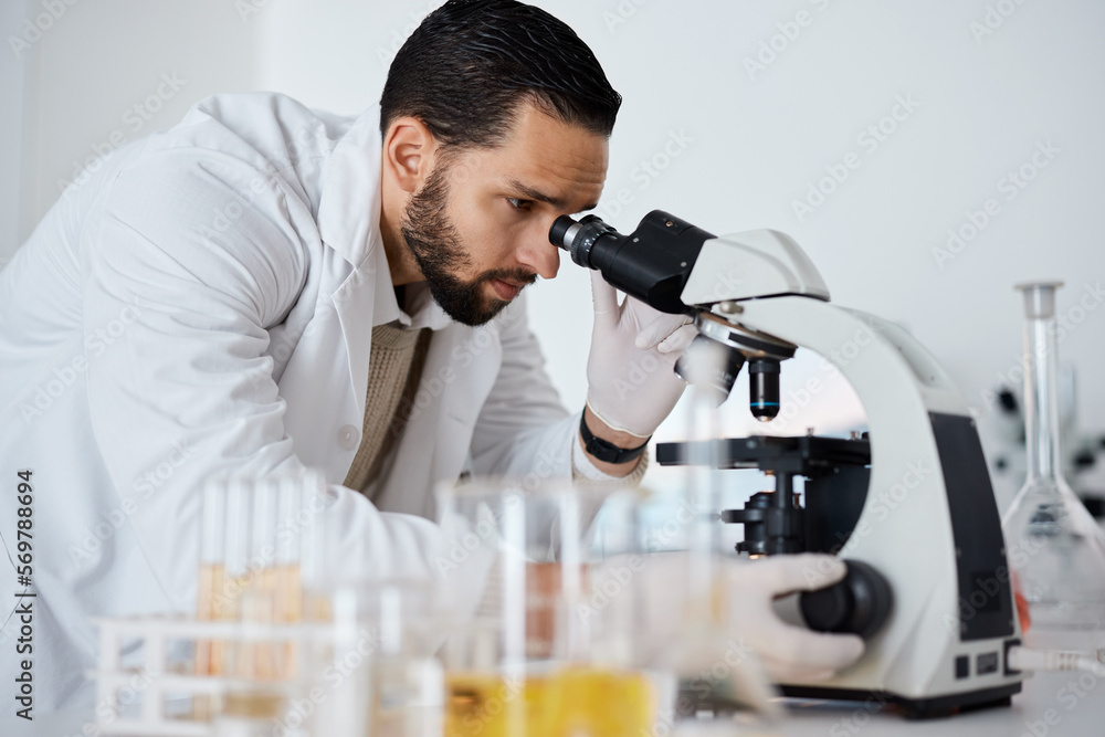 Poster Science, microscope and research with a doctor man at work in a laboratory for innovation or development. Medical, analytics and biotechnology with a male scientist working in a lab for breakthrough