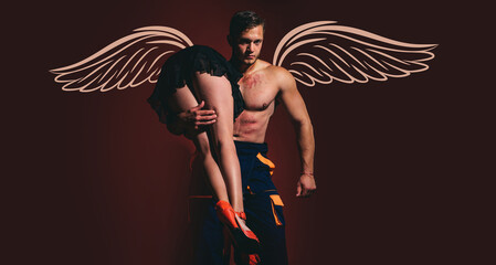 Angels couple, valentines day photo banner. Firefighter sexy body muscle man holding saved sexy...
