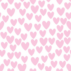 Seamless abstract pattern of small pink hearts on white background. Love backdrop, cute texture for textile, wrapping paper, Valentine's day.
