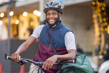 Black man, bicycle and portrait smile in the city for travel, trip or delivery with bag outdoors. Happy African American male on bike smiling for traveling, adventure or transport in an urban town
