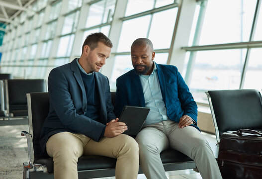 Airport diversity, tablet or business people teamwork on finance portfolio review, stock market database or investment. Economy, travel or crypto trader collaboration on NFT, bitcoin or forex trading - Powered by Adobe