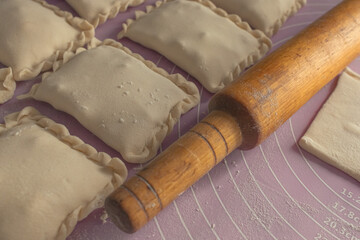 Puff pastry. Sweet baking. Molded dough products. Homemade pies. Cozy still life. Dessert baking. Grocery store. Sculpt from the dough.