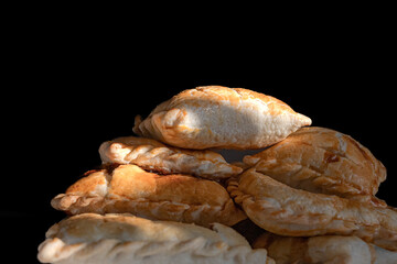 Fresh sweet pastries. Blush homemade pies. Crispy crust. A plate with dessert. Grocery products. Homemade pies. Cozy still life.