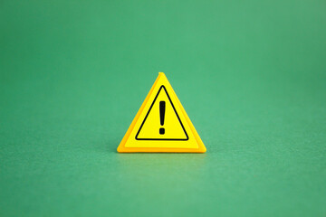 exclamation mark in yellow triangle. the concept of danger or caution