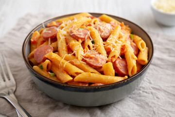 Homemade One-pot Hot Dog Pasta in a Bowl, side view. Close-up.
