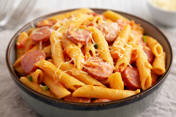Homemade One-pot Hot Dog Pasta in a Bowl, low angle view. Close-up.