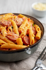 Homemade One-pot Hot Dog Pasta in a Bowl, side view. Close-up.