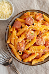 Homemade One-pot Hot Dog Pasta in a Bowl, top view. Flat lay, overhead, from above. Close-up.