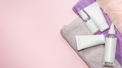 Composition with skin care products. Beauty SPA branding mockup on pink table background. opy space