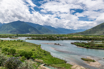 Naklejka na ściany i meble Niyang River landscape in Nyingchi city Tibet Autonomous Region, China.