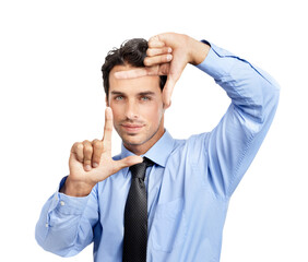 A handsome young male model in corporate attire or a businessman making a frame with his fingers isolated on a png background.