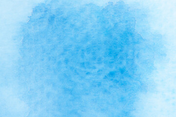Obraz premium Blurred image of watercolor, blue, streak gradient color combinations on drawing paper, used as a background.