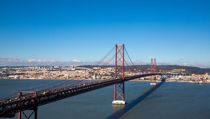 Landscape of the April 25 bridge between Almada and Lisbon - Portugal