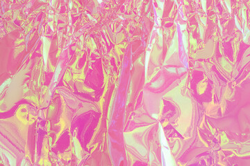 Fototapeta na wymiar Background of crumpled pink metal foil