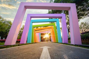 Beautiful view of sun shining through frame at park, Corridor and sun rays in garden