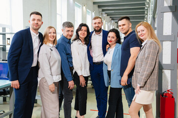 Fototapeta premium a group of men and women in coworking. the concept of teamwork.