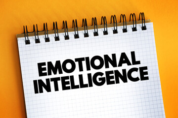 Emotional intelligence - ability to perceive, use, understand, manage, and handle emotions, text concept on notepad