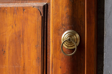 Brass door handle. Architectural details of the building in Istanbul.