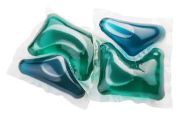 Two washing gel capsule pods with laundry detergent isolated on transparent background