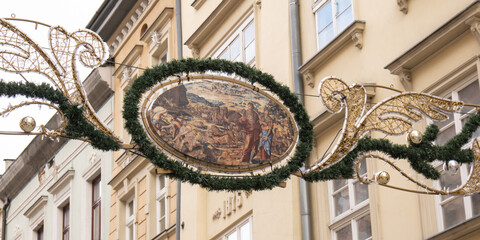 Krakow Main Square Rynek Glowny Poland christmas decorations. Krakow architecture, old city architecture. Historic church in Krakow Baroque architecture Travel tourist attraction