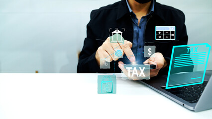 Businessman using a smartphone and laptop to complete an income tax return form online. State taxes. Data analysis, paperwork, Financial research, government taxes, Calculation tax return concept. 