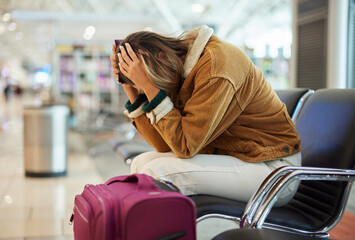 Upset woman, airport and flight delay sitting on bench in travel restrictions or plane cancelation...