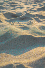 Fototapeta na wymiar sand with the warm glow of the morning sun